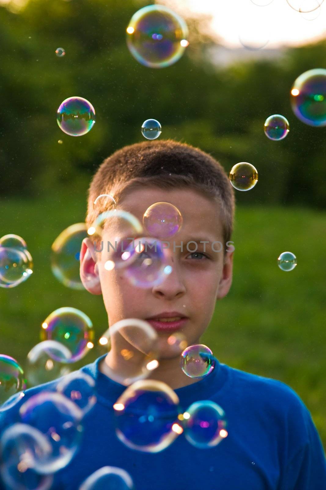 children series: boy play with soap bubbles