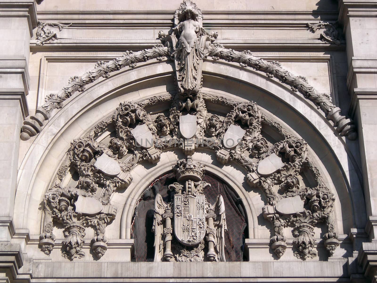 View of the Spain's Coat of Arms in the facade of the new Madrid's Major House, also known as Saint Mary of the Telecommunications.