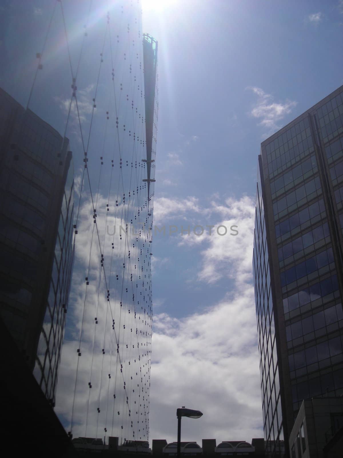 The light of the sun over the glass of a London's skyscraper.