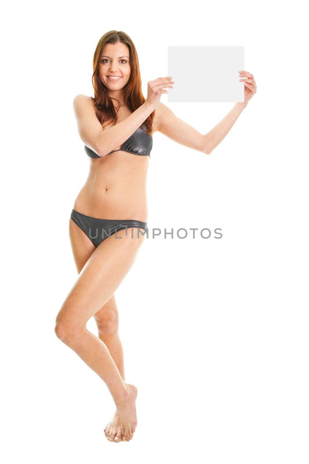 Sexy girl in bikini making an announcent. Isolated on white