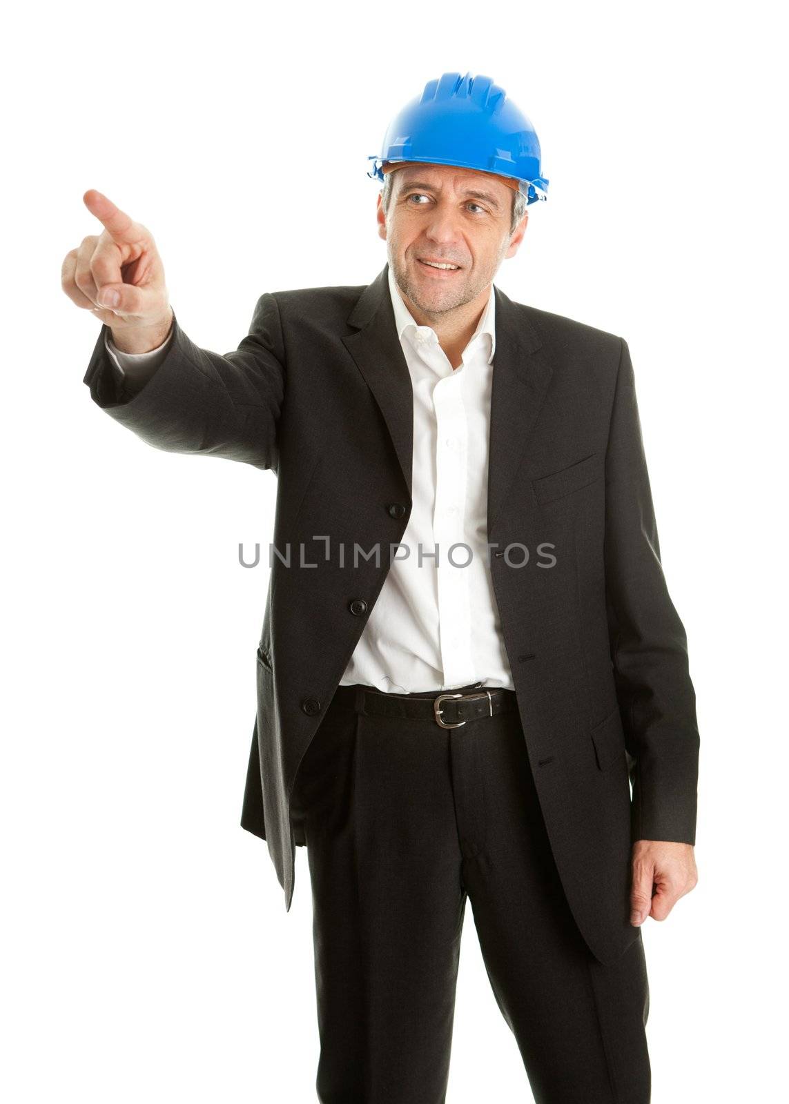 Portrait of successfull architect wearing blue hard hat and pointing. Isolated on white