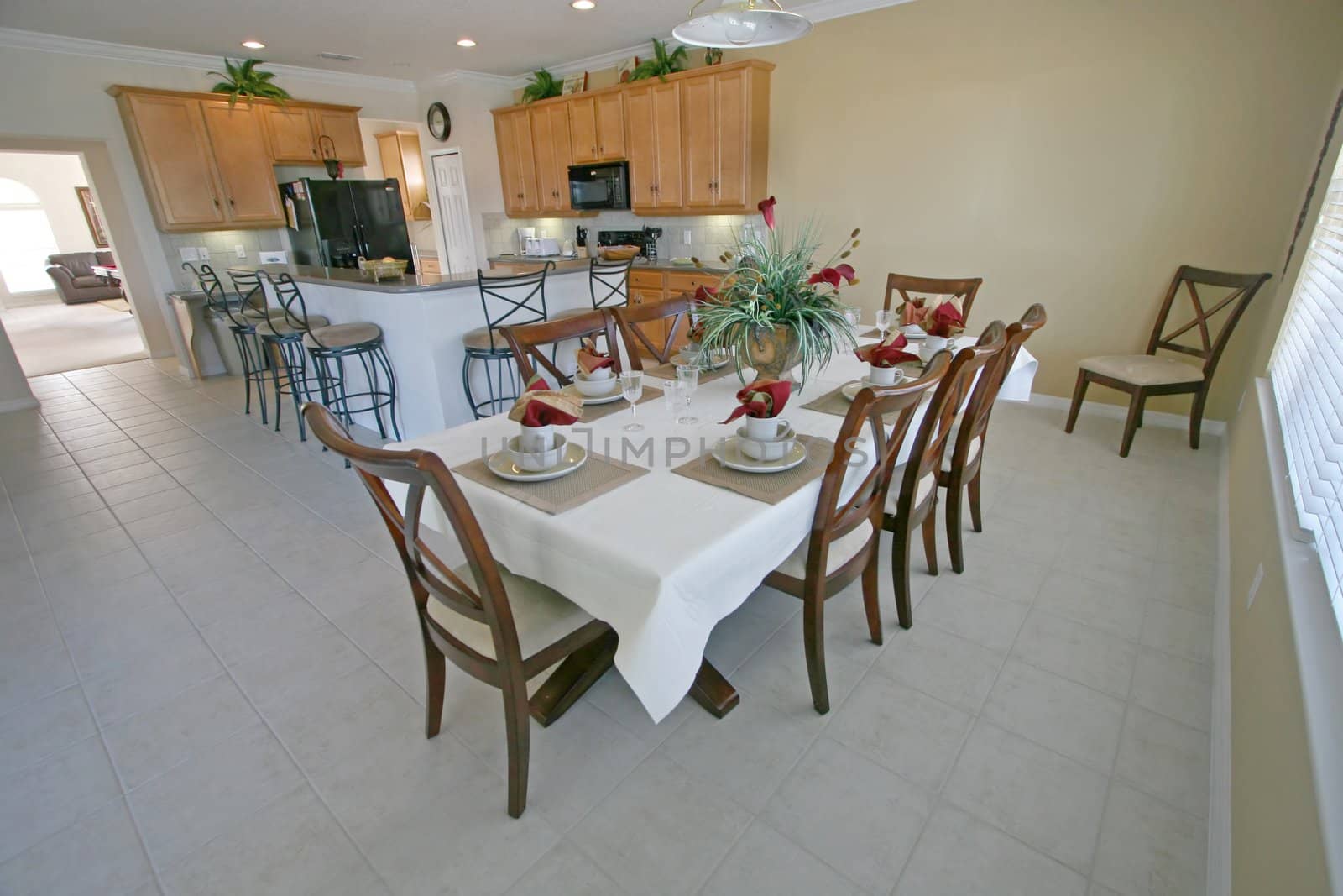 A Kitchen and Dining Area in a House.