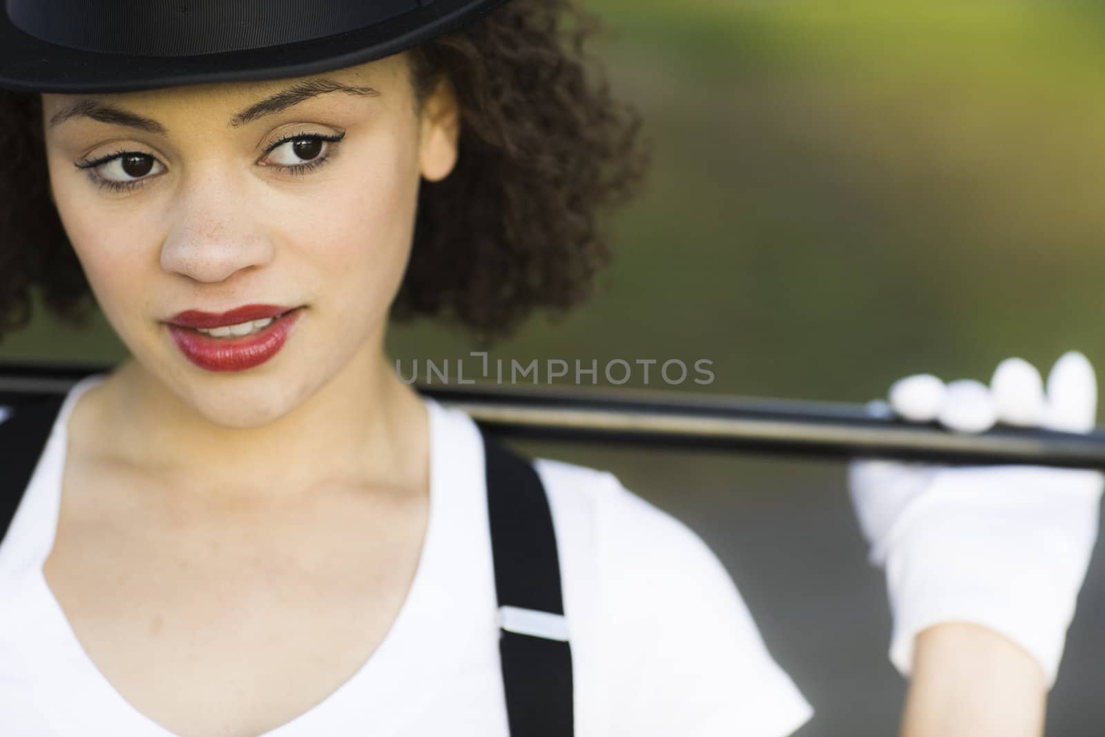 Portrait of Jazz Dancer in Tophat, Gloves and Suspenders