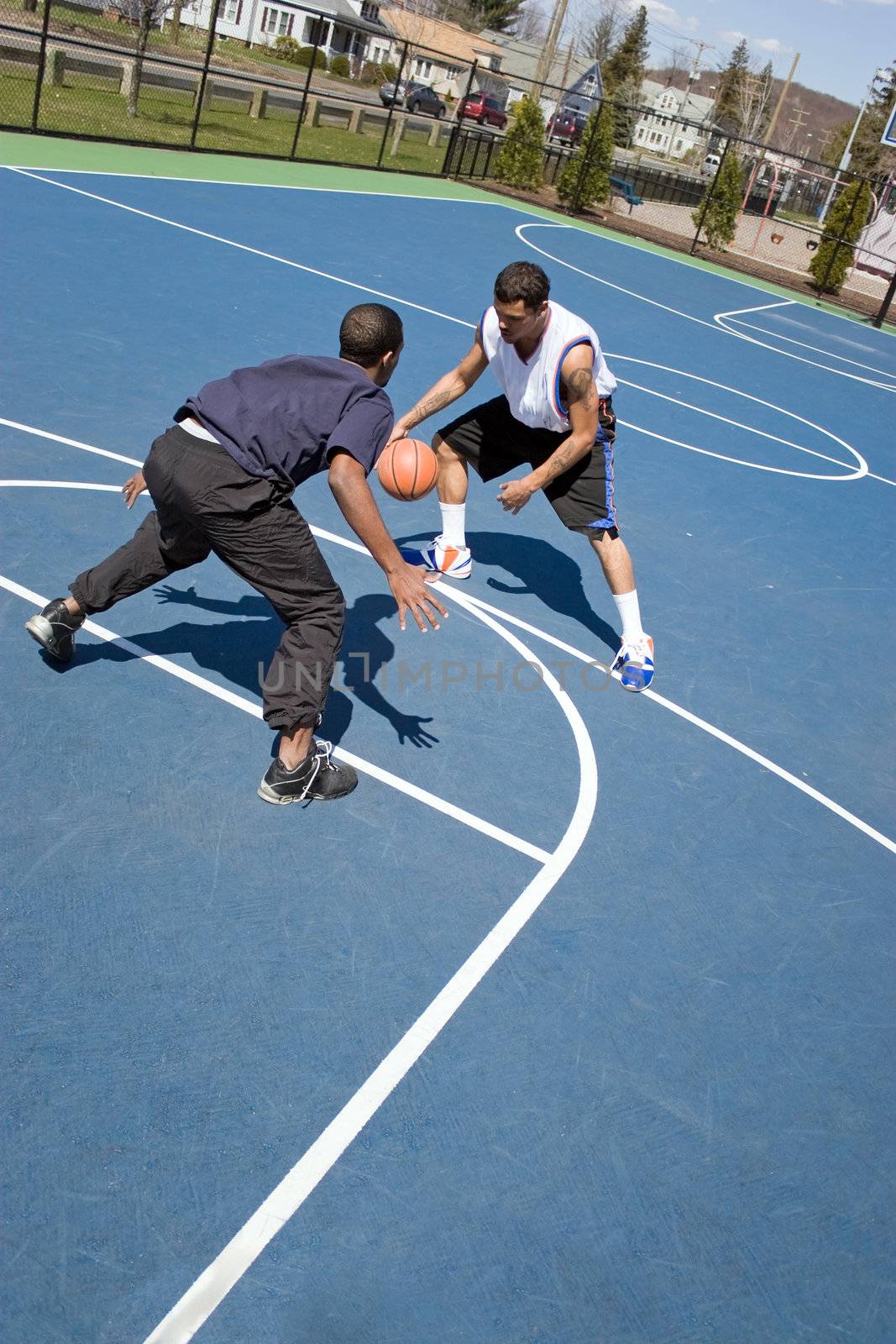 Men Playing Basketball by graficallyminded