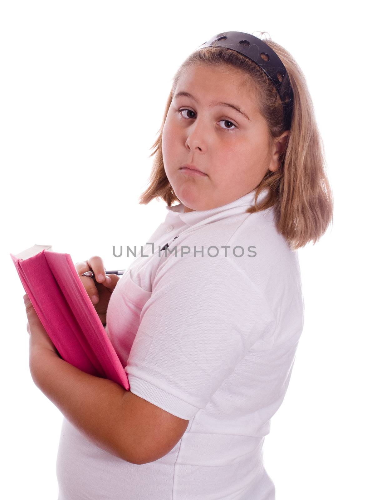A young girl trying to hide her diary, isolated against a white background