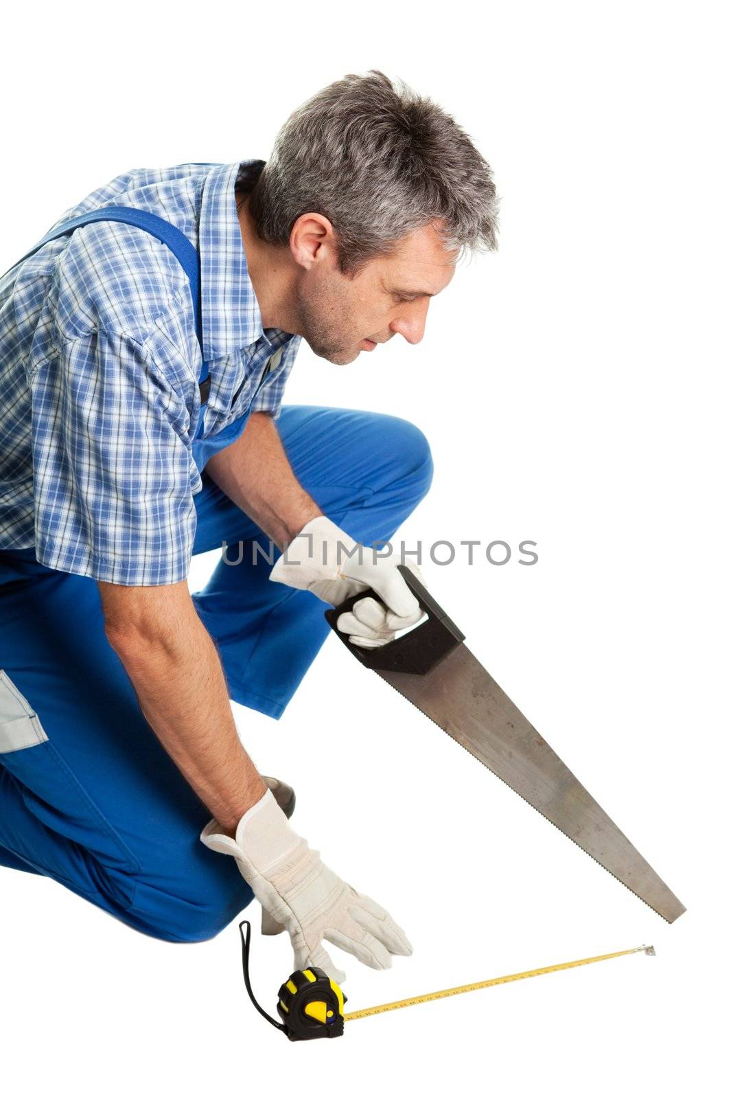 Confident service man cutting wit saw. Isolated on white