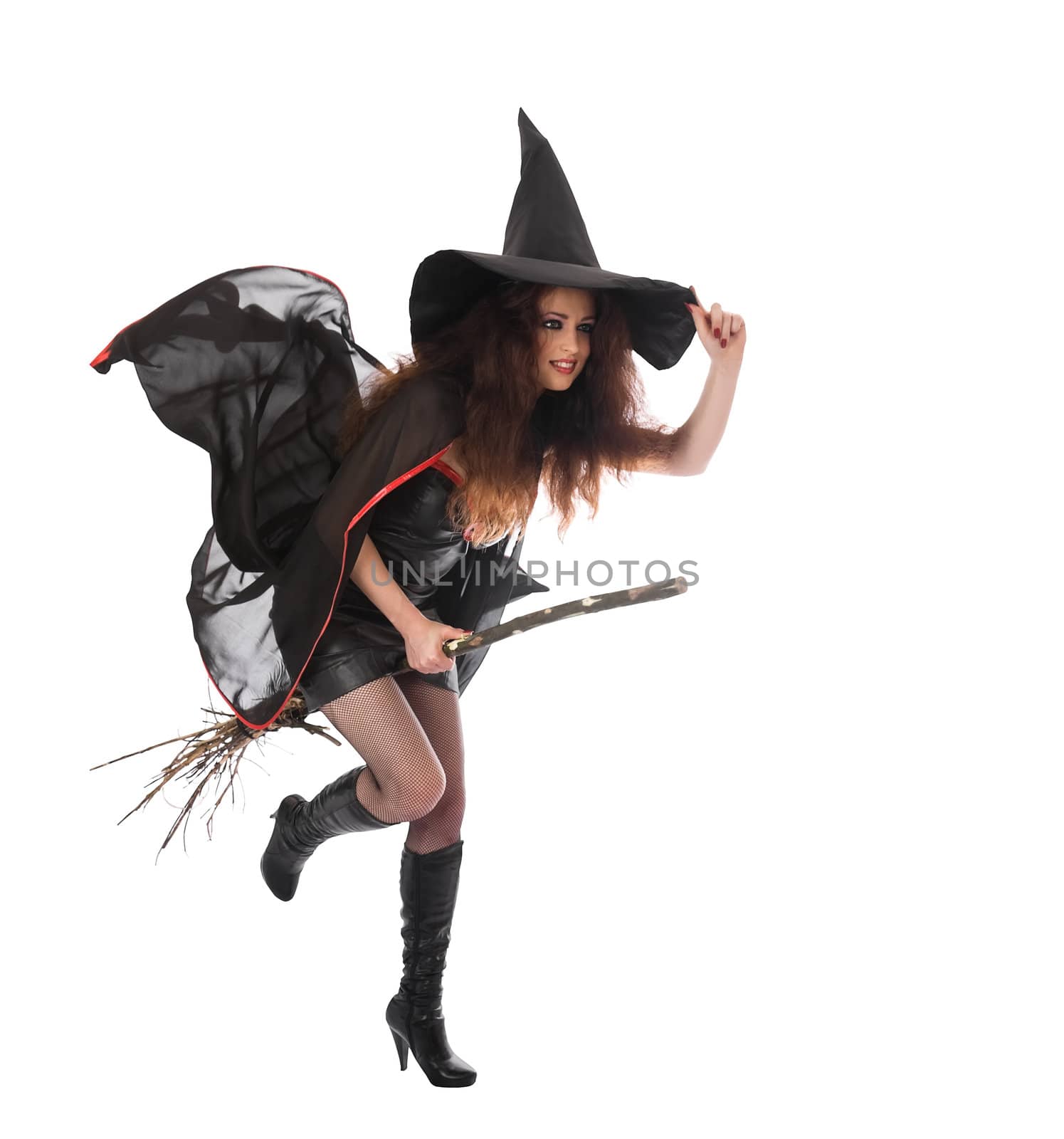 Halloween witch flying on broom. Isolated