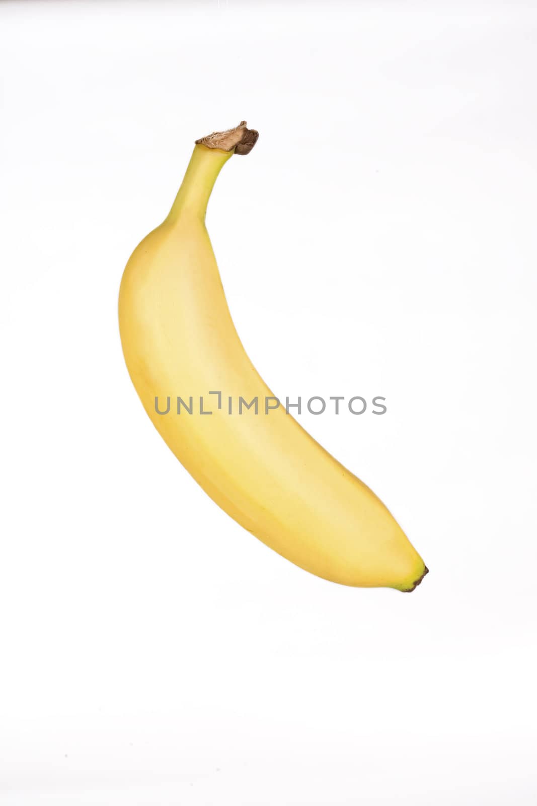 One ripe yellow banana isolated on white by jarenwicklund