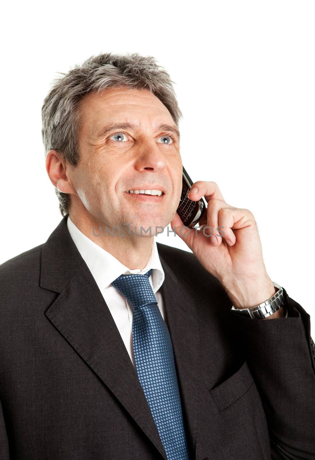 Senior business man talking on cellphone. Isolated on white
