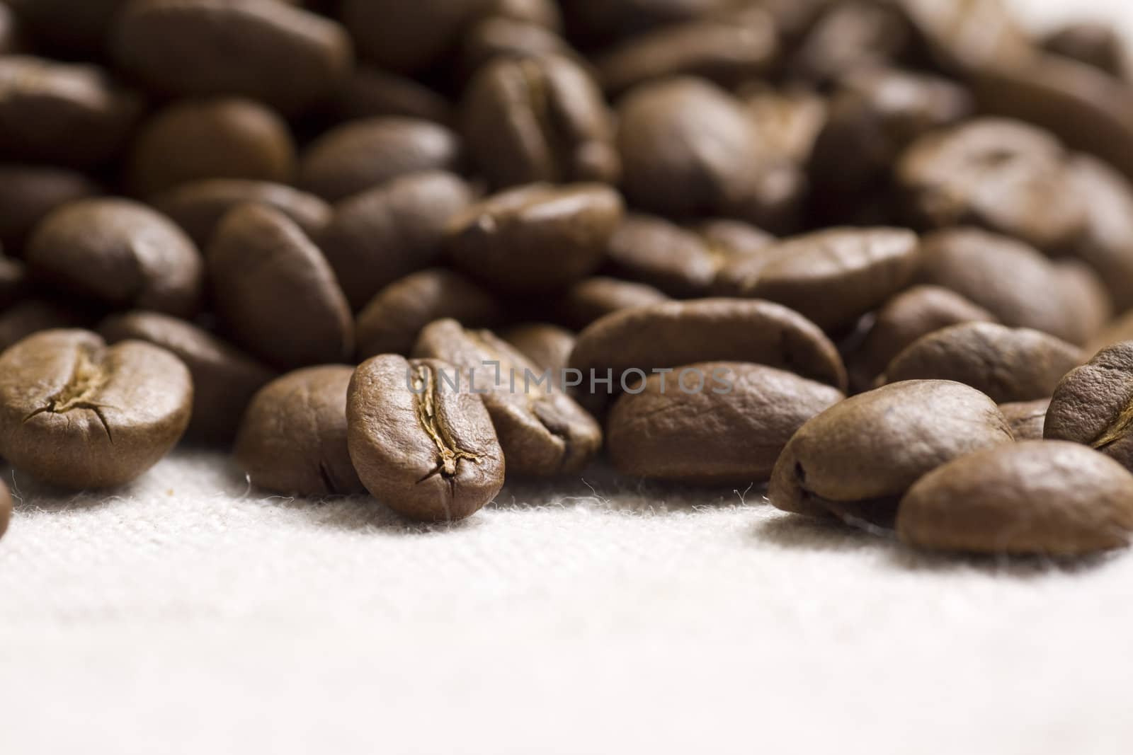 Roasted coffee beans on jute sacking