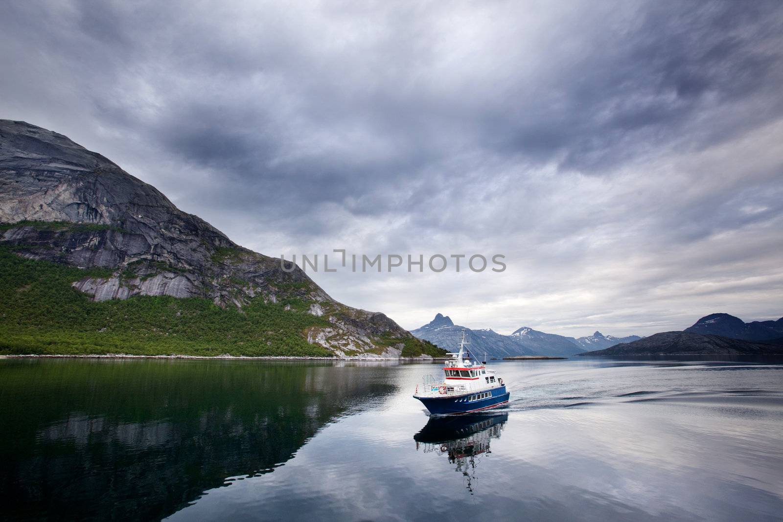 A small ferry in northern Norway on the ocean