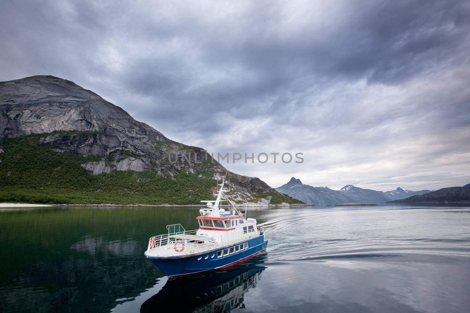 A small ferry in northern Norway on the ocean