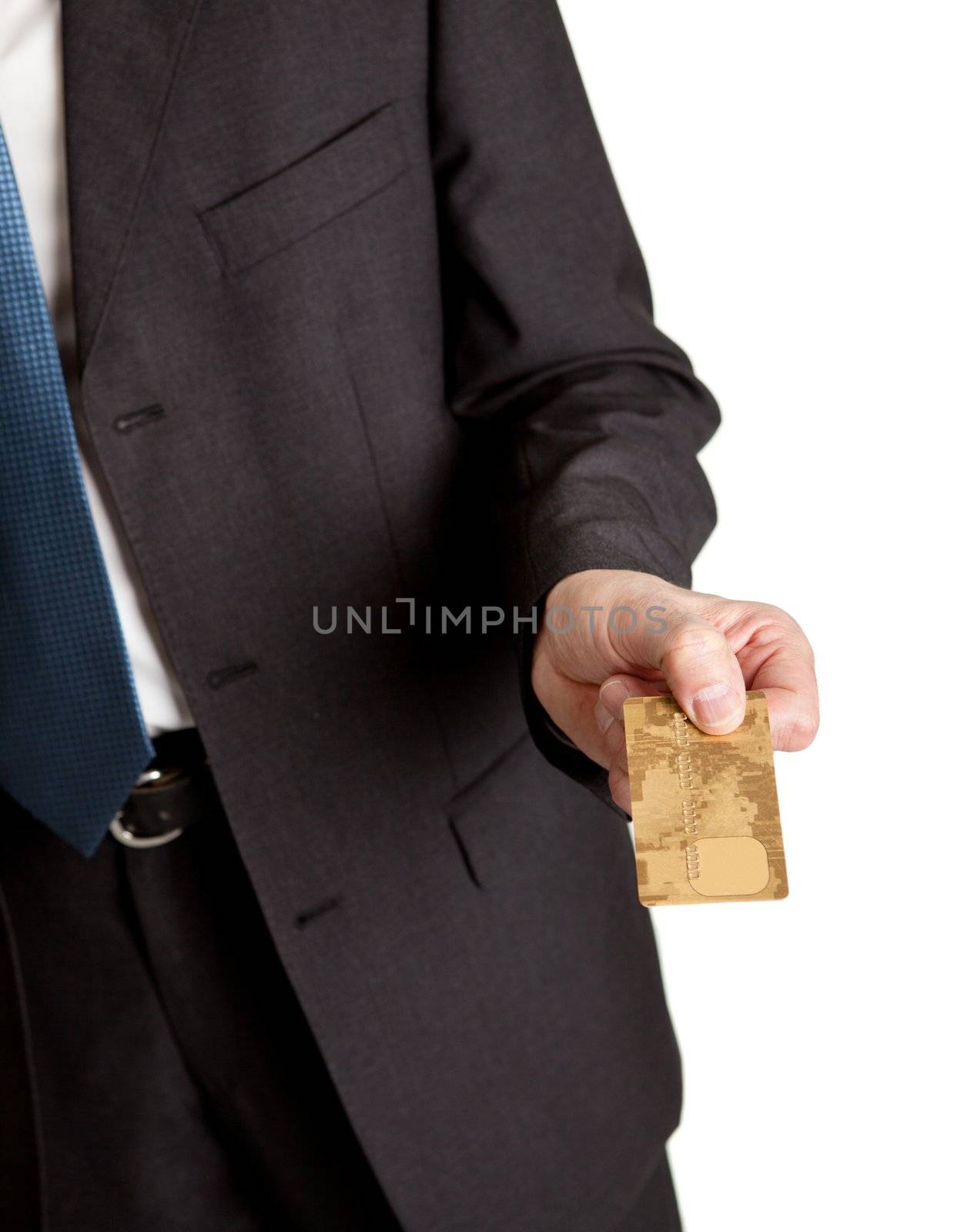 Close-up of businessman holding credit card. Isolated on white