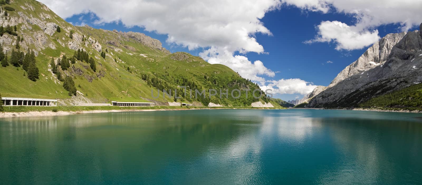 The artificial lake and pass of Fedaia (Dolomites, Trentino, Italy), at summer