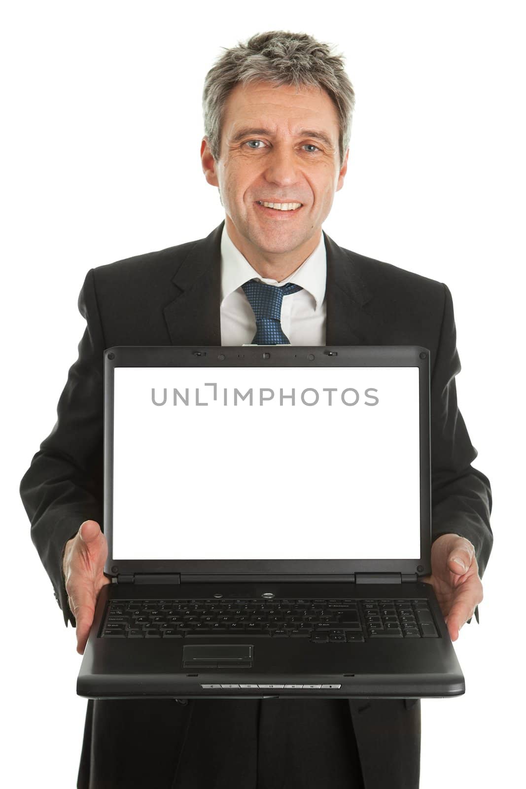 Business man presenting laptopn. Isolated on white