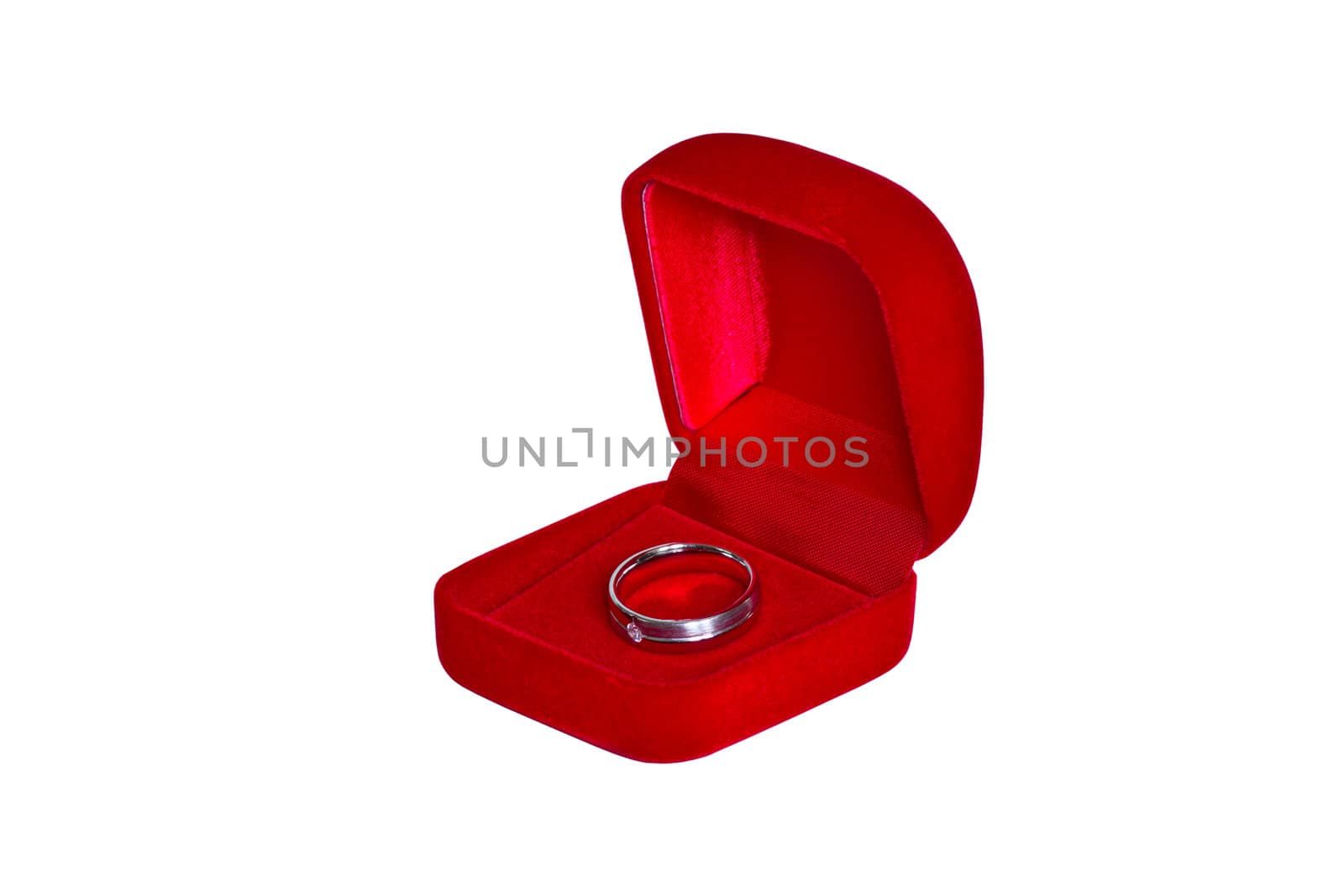 Ring in open red velvet box  isolated on white background by lavoview