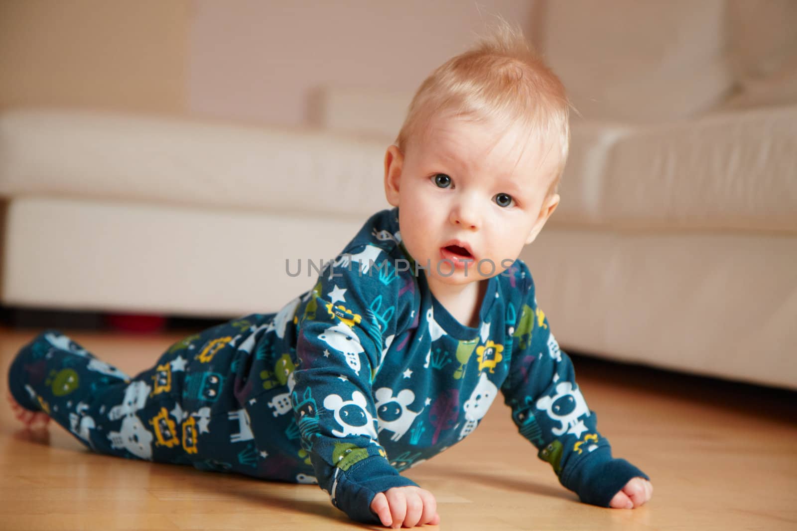 baby crawling on a floor