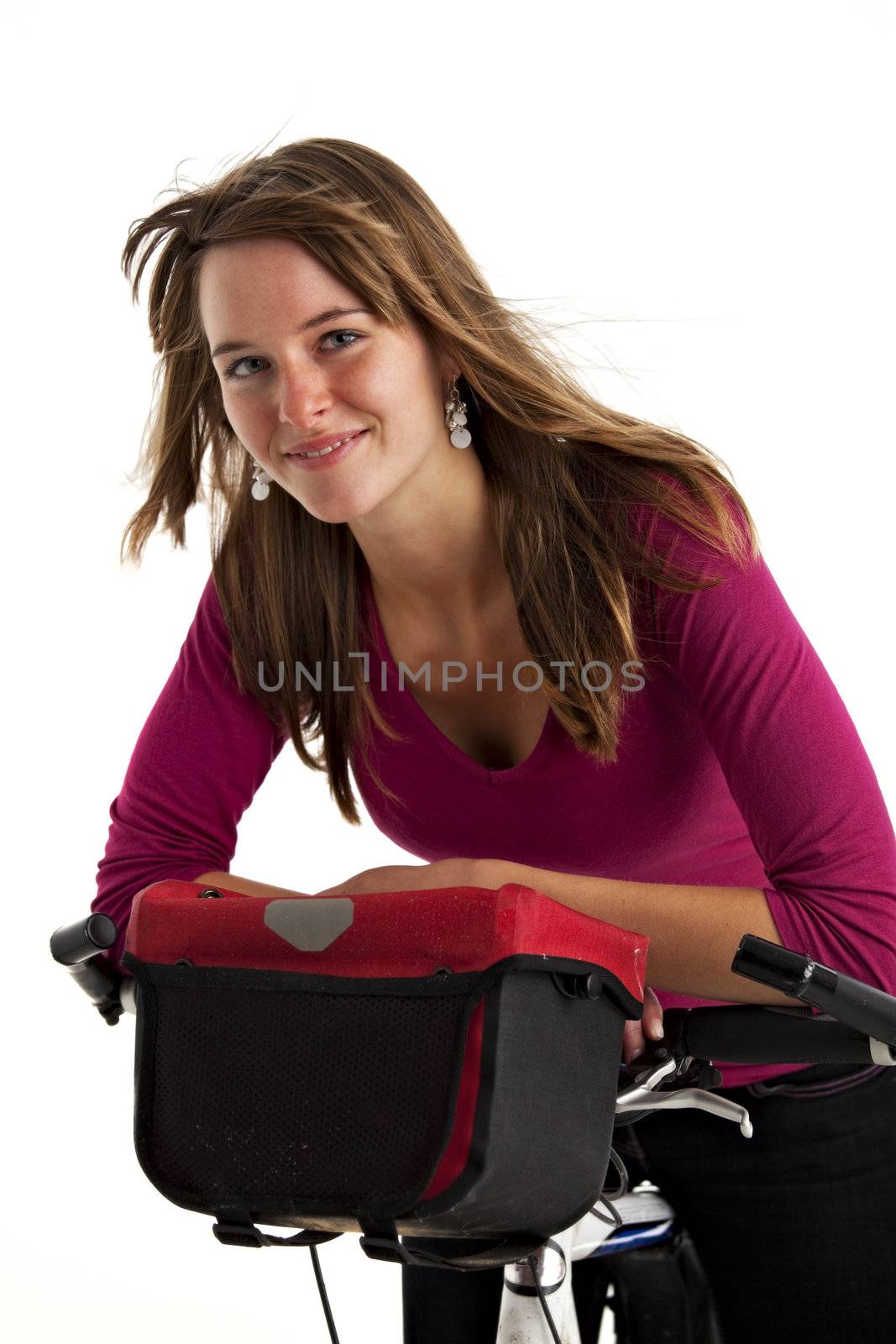 pretty young woman on a mountain bike isolated on white by bernjuer