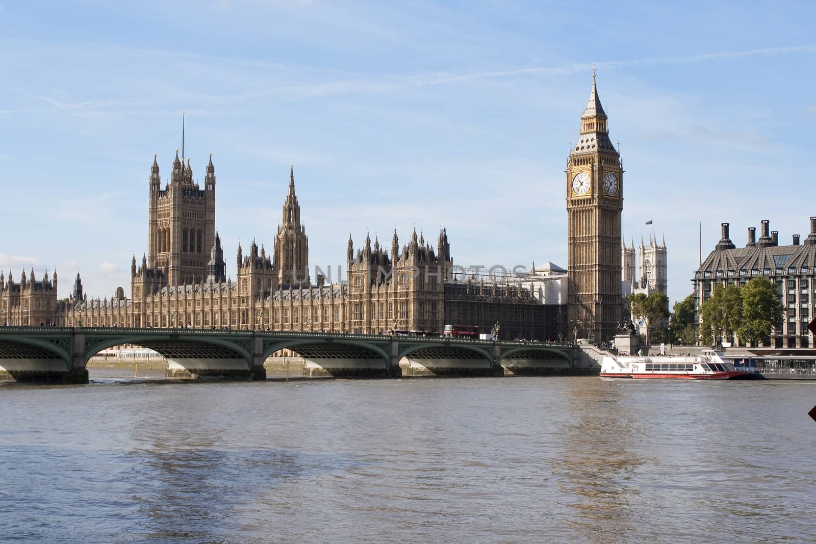 The Big Ben and Westminster bridge in London in a beautiful day