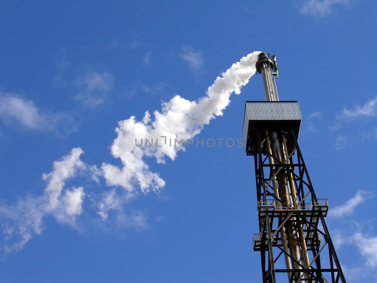 Power gasoline oil pipe on a background of blue sky