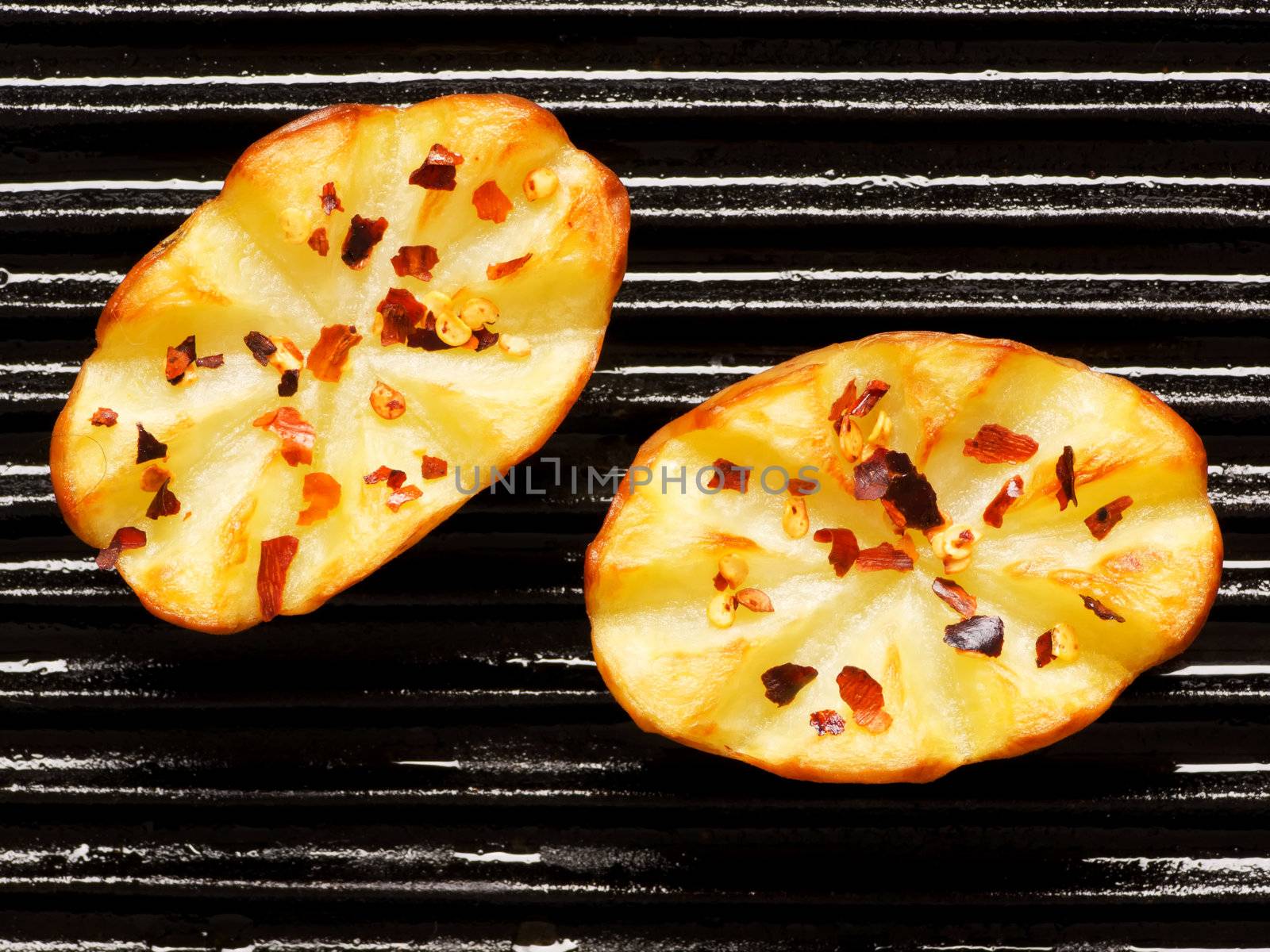 close up of baked potatoes