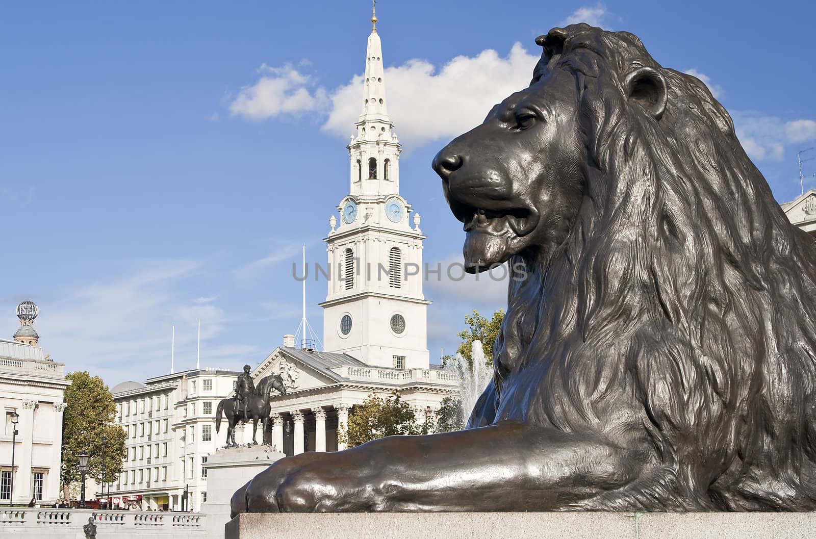 Statue of a lion in the Nelson column in Trafalgar Square in London