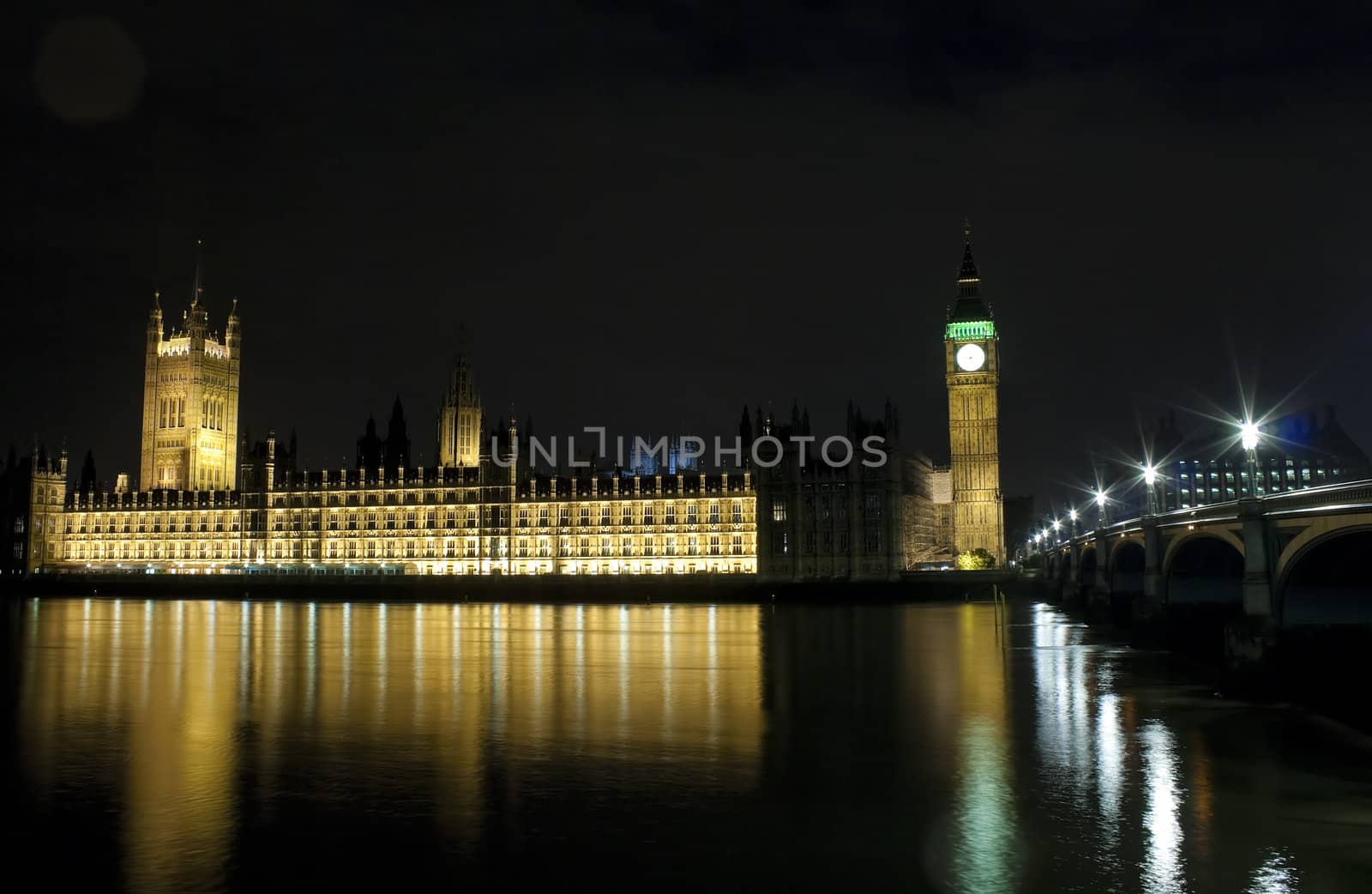 The Houses of Parliament and Westminster Bridge in London at night