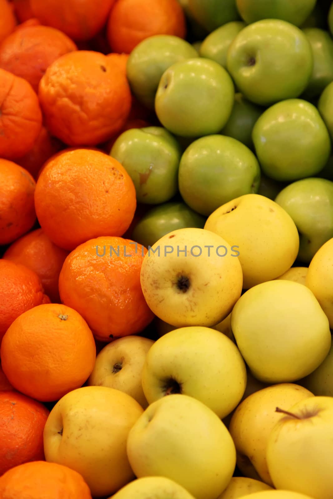 Apples and Oranges Fruits on Grocery Store