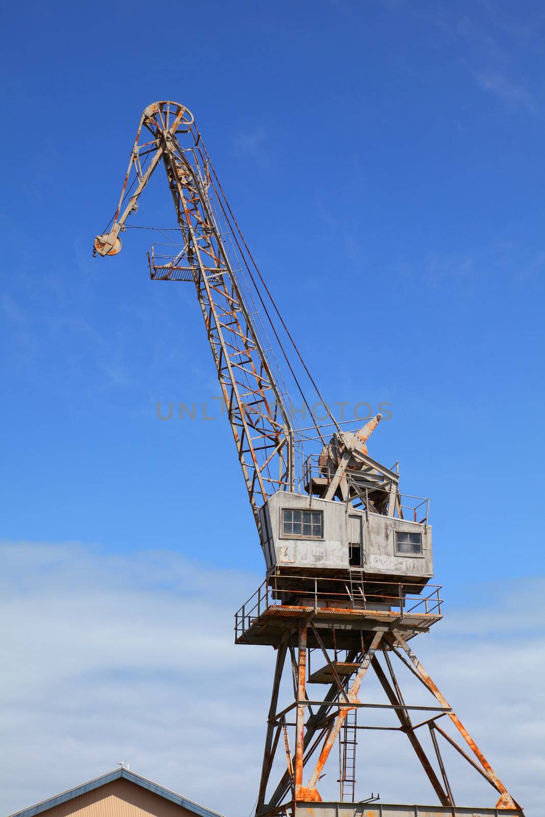 Retired Steel Construction Crane in a Shipyard