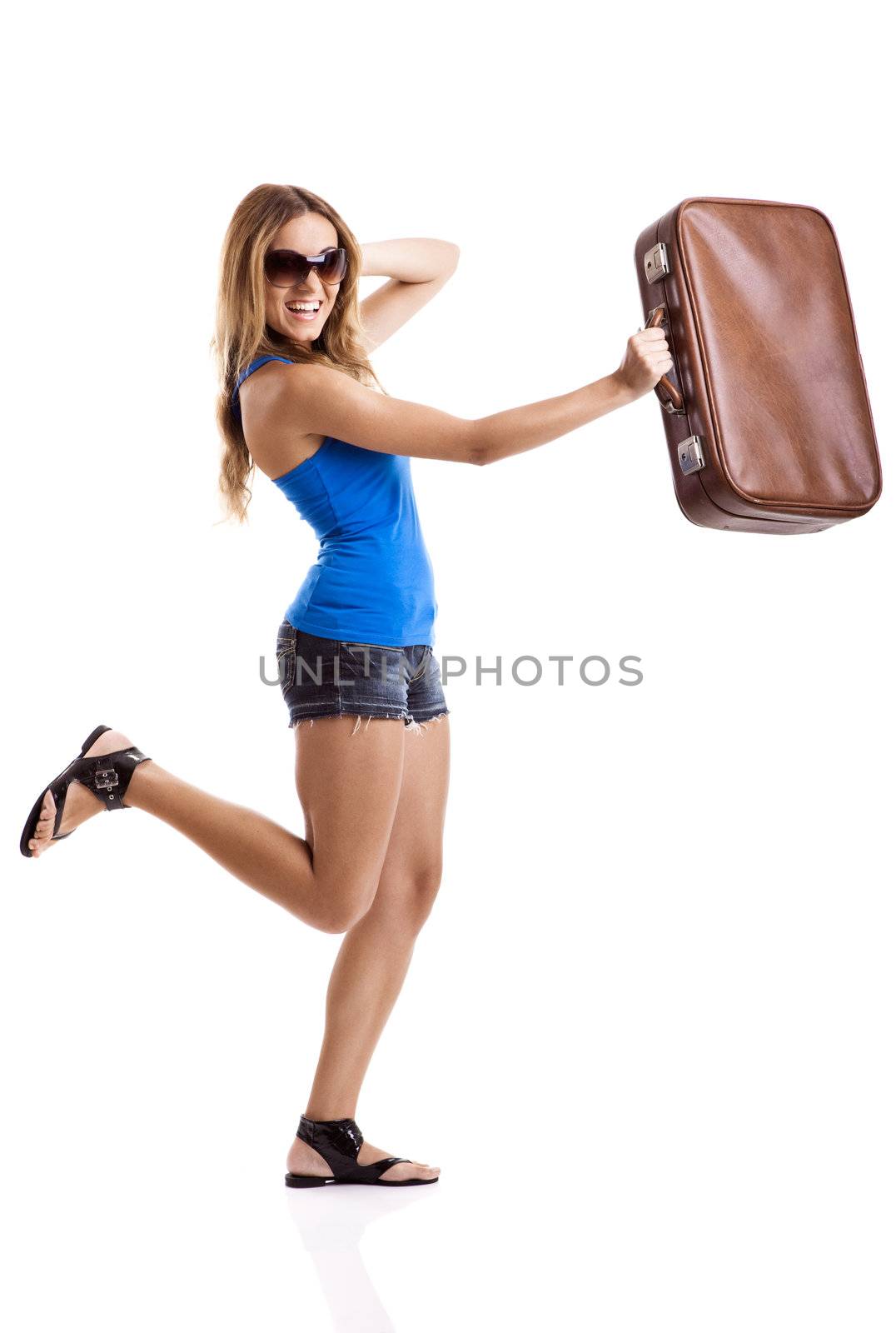 Beautiful and happy  young woman with old leather suitcase, isolated on white