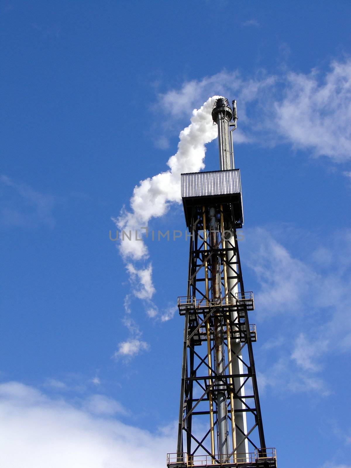 Power gasoline oil pipe on a background of blue sky