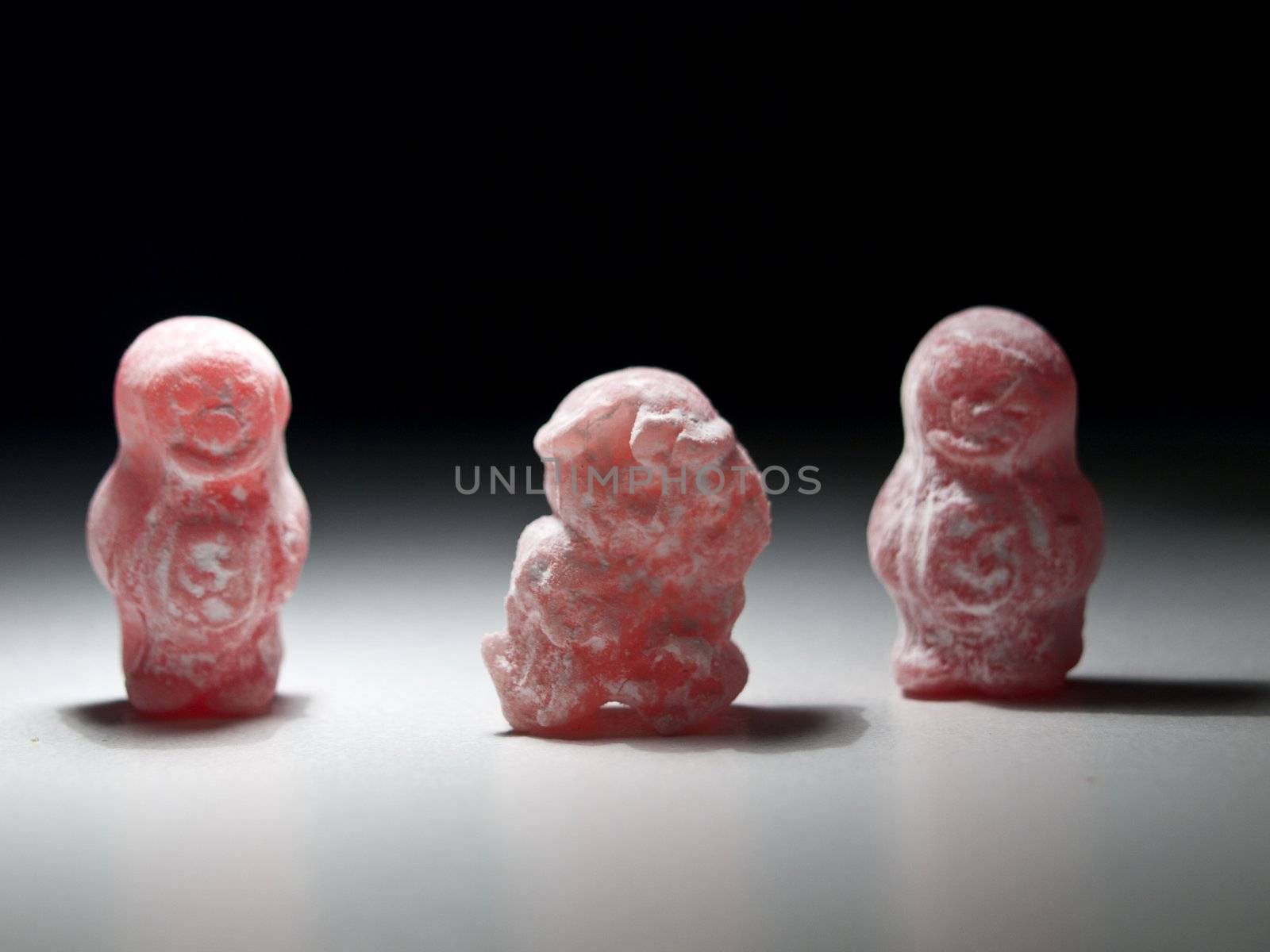 three jelly babies arranged creativly for a fun picture