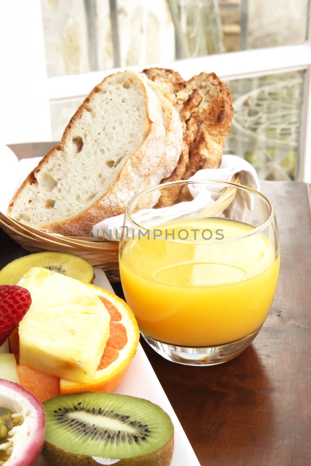 Orange Juice Cup with a Breakfast Meal