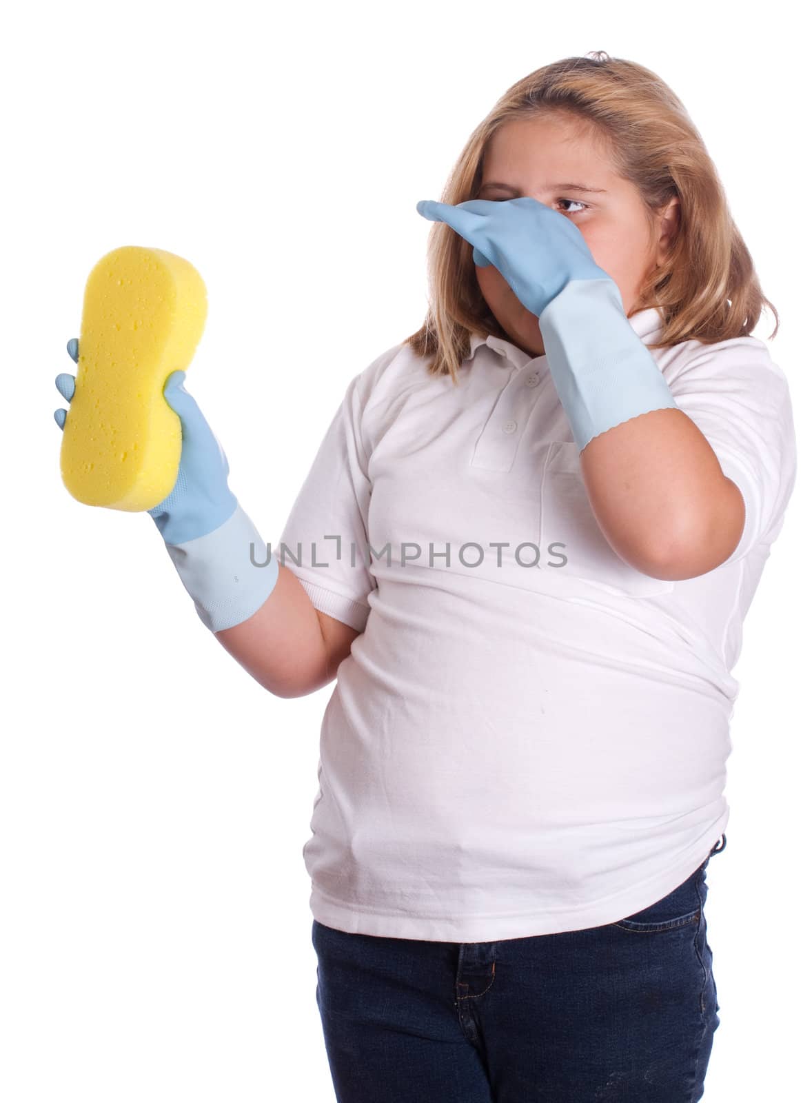 A young girl holding her breath because the of the smell of cleaning something, isolated against a white background