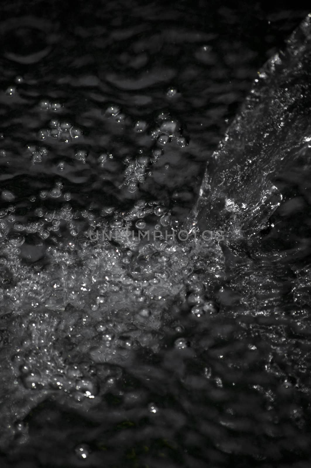 closeup of water splashing with lots of bubbles