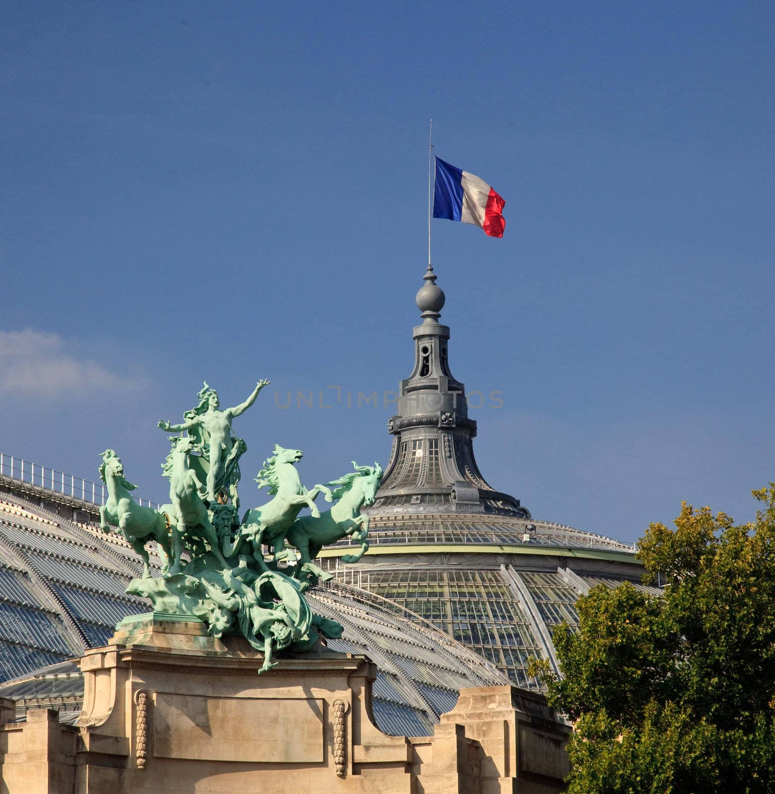 Grand Palais in Paris with green statue in foreground