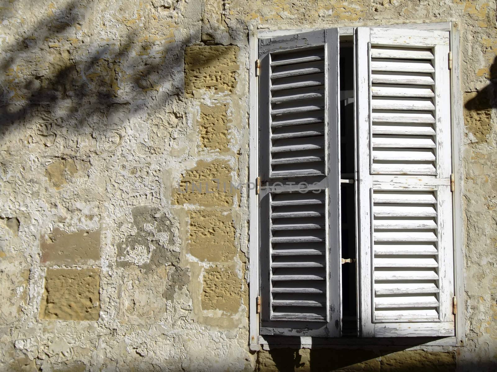 Medieval facade of house in the old city of Mdina, Malta - Window Detail