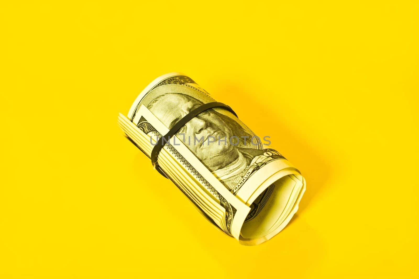 money series: hudreds of dollar roll ober yellow