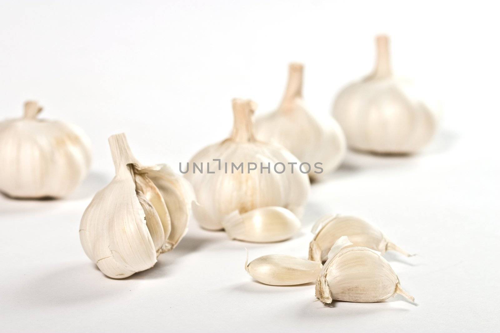 some garlic over white background, healthy eating