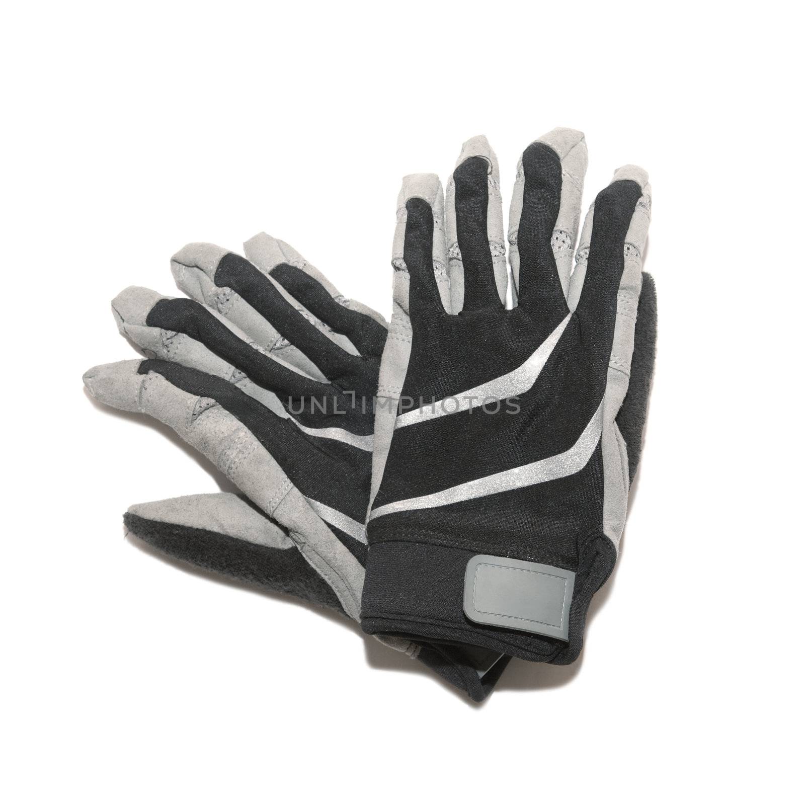 Gray and black ski gloves isolated over white