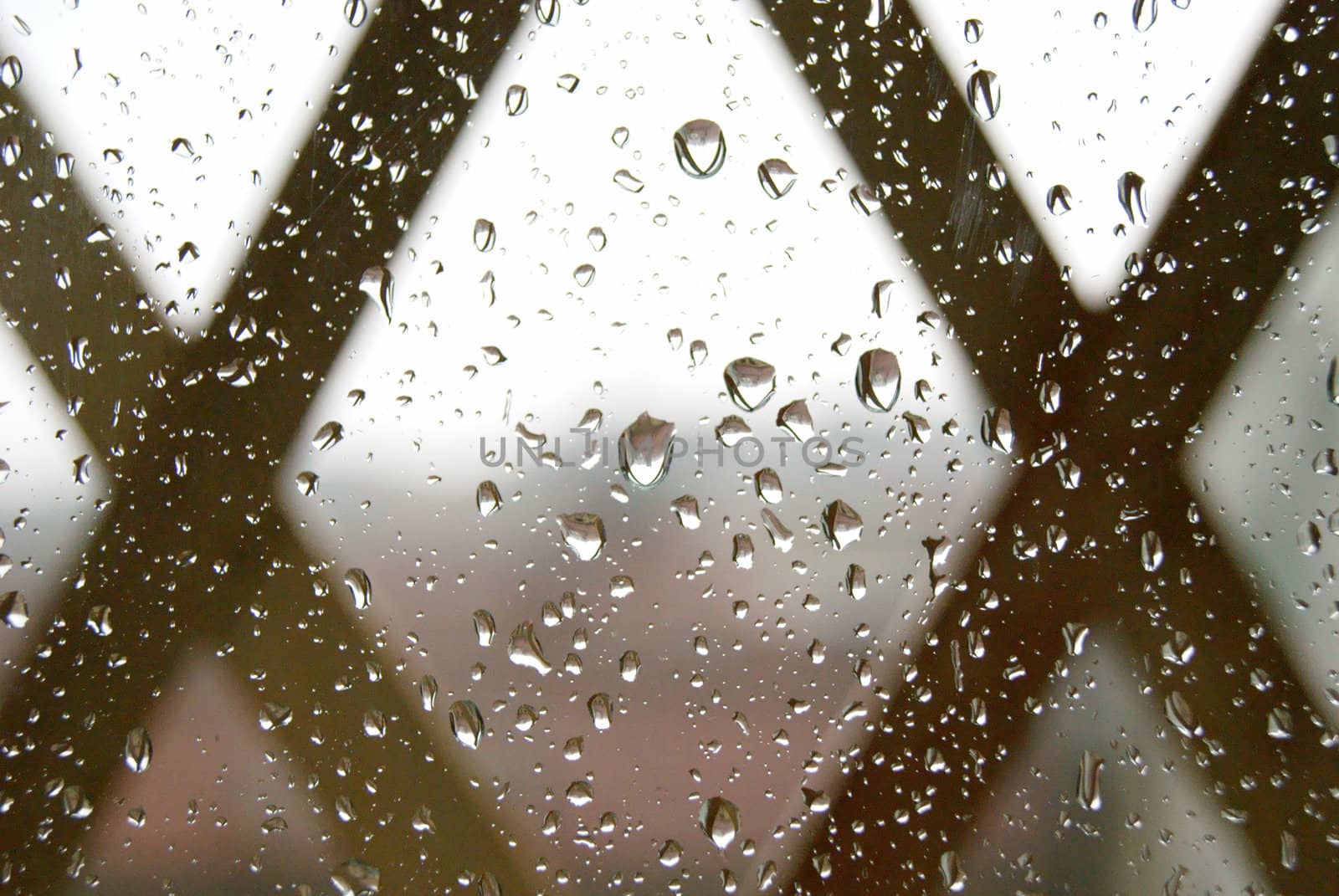 Spring strong refreshing rain on the window