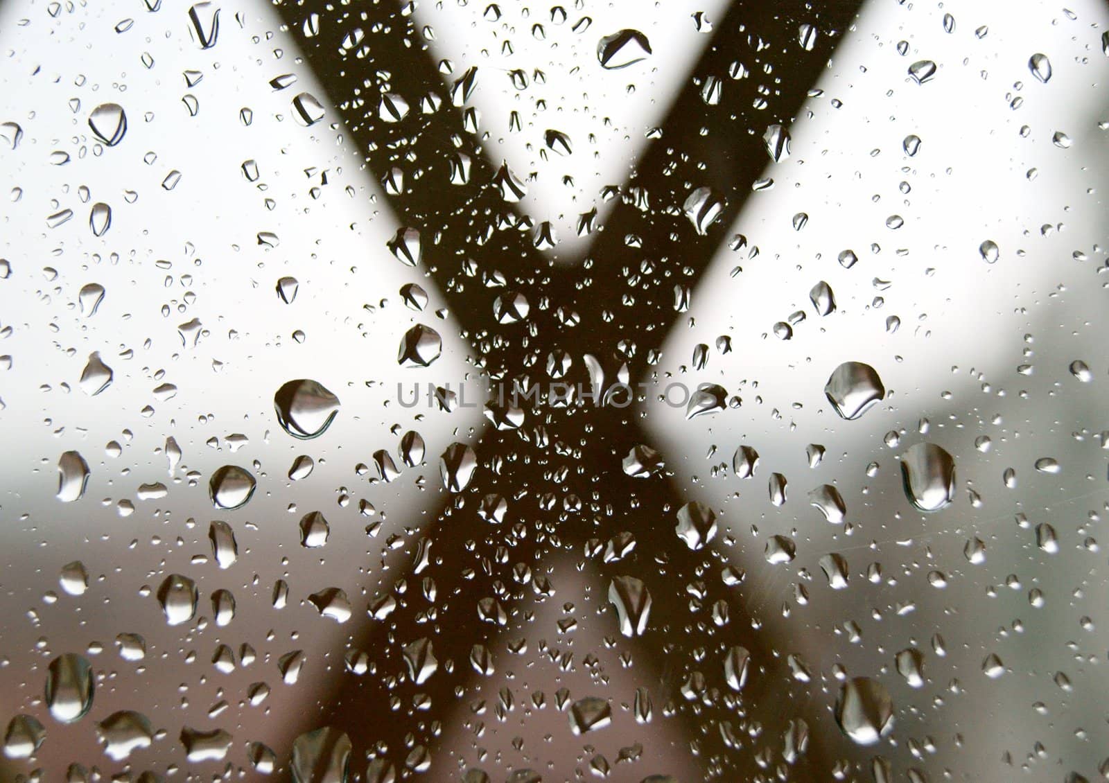 Spring strong refreshing rain on the window