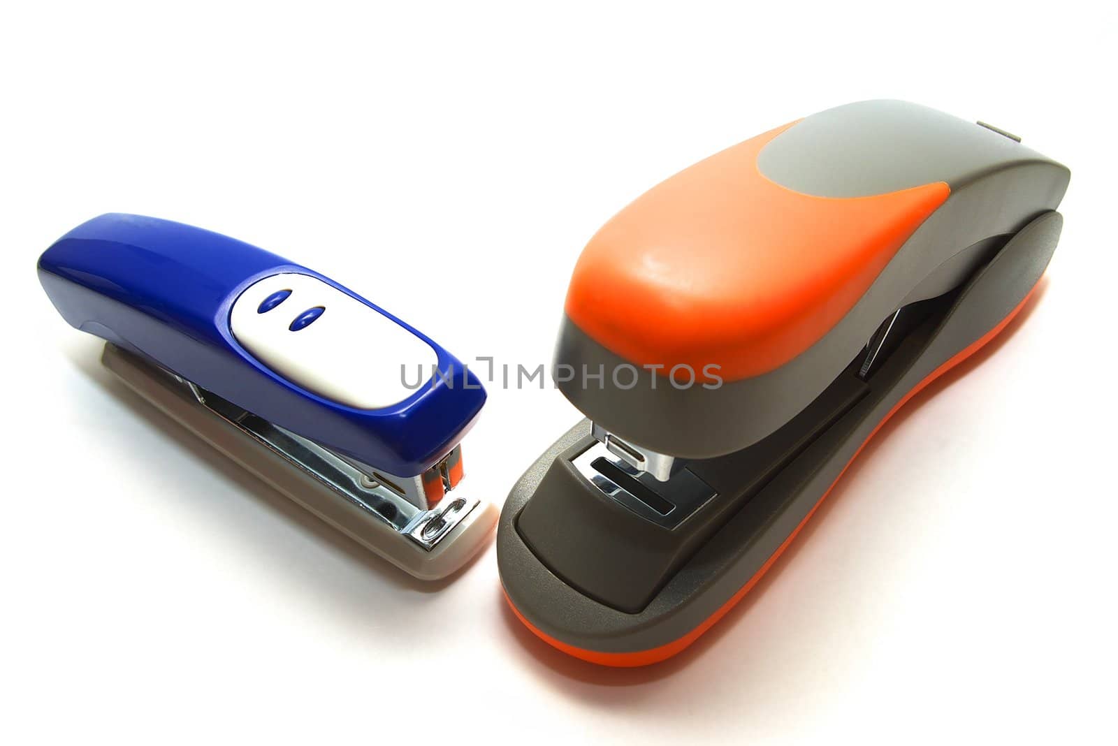 photo of staplers on white background