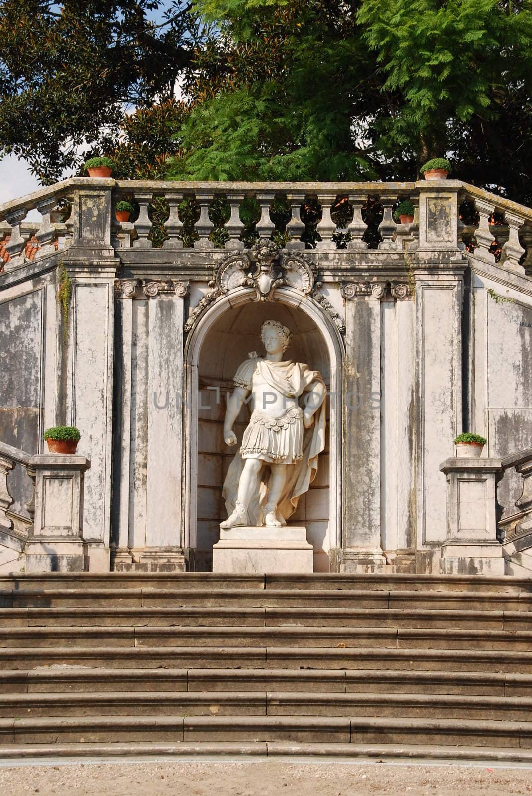 antique staircase and statue in Ajuda garden in Lisbon, Portugal