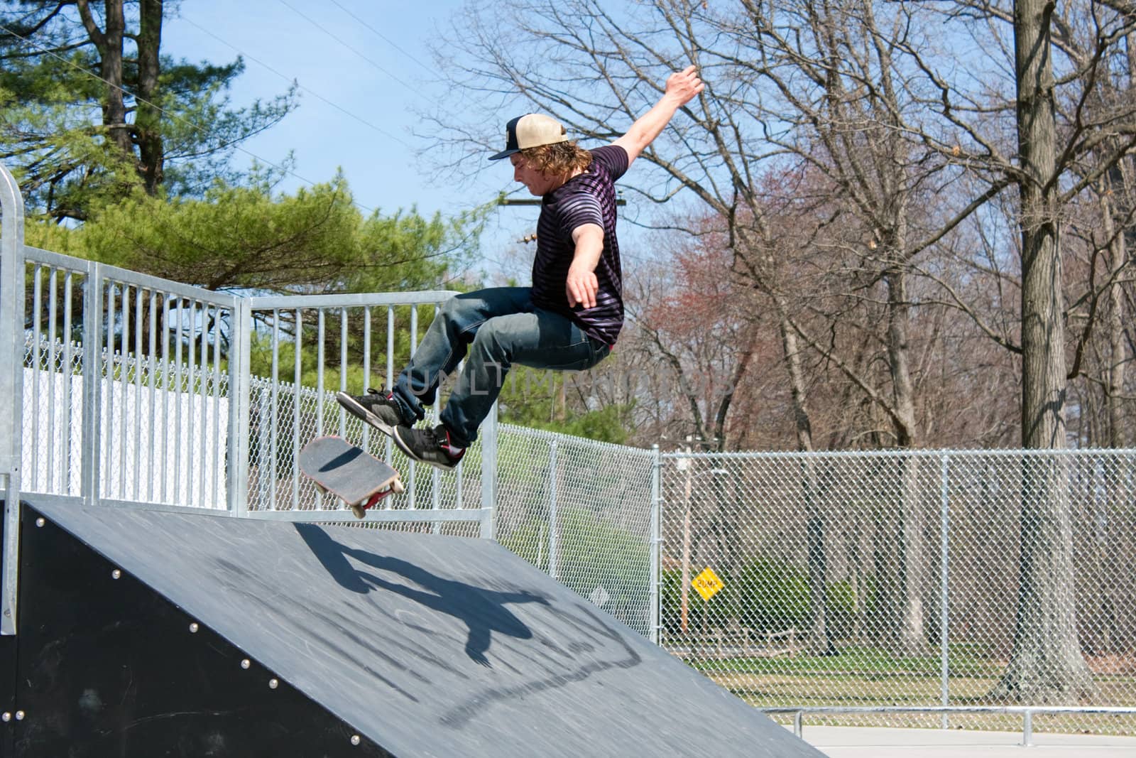 Skateboarder On a Skate Ramp by graficallyminded