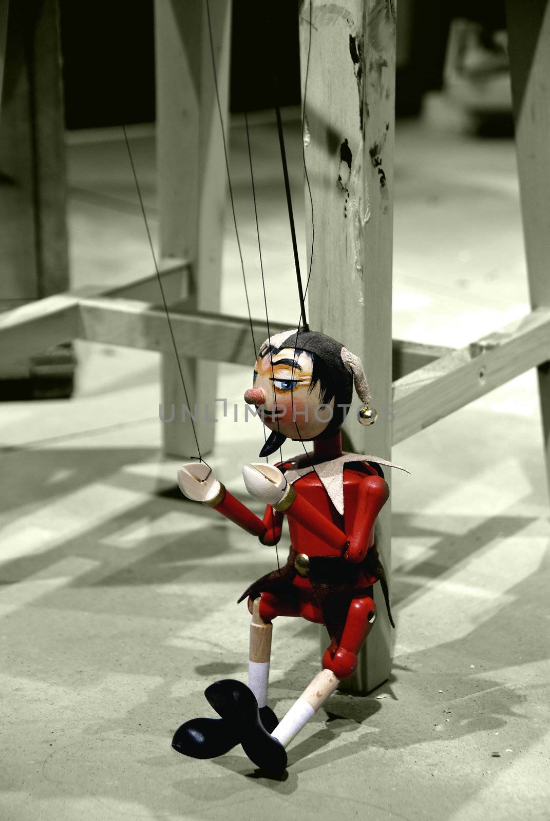 Wooden toy as marionette