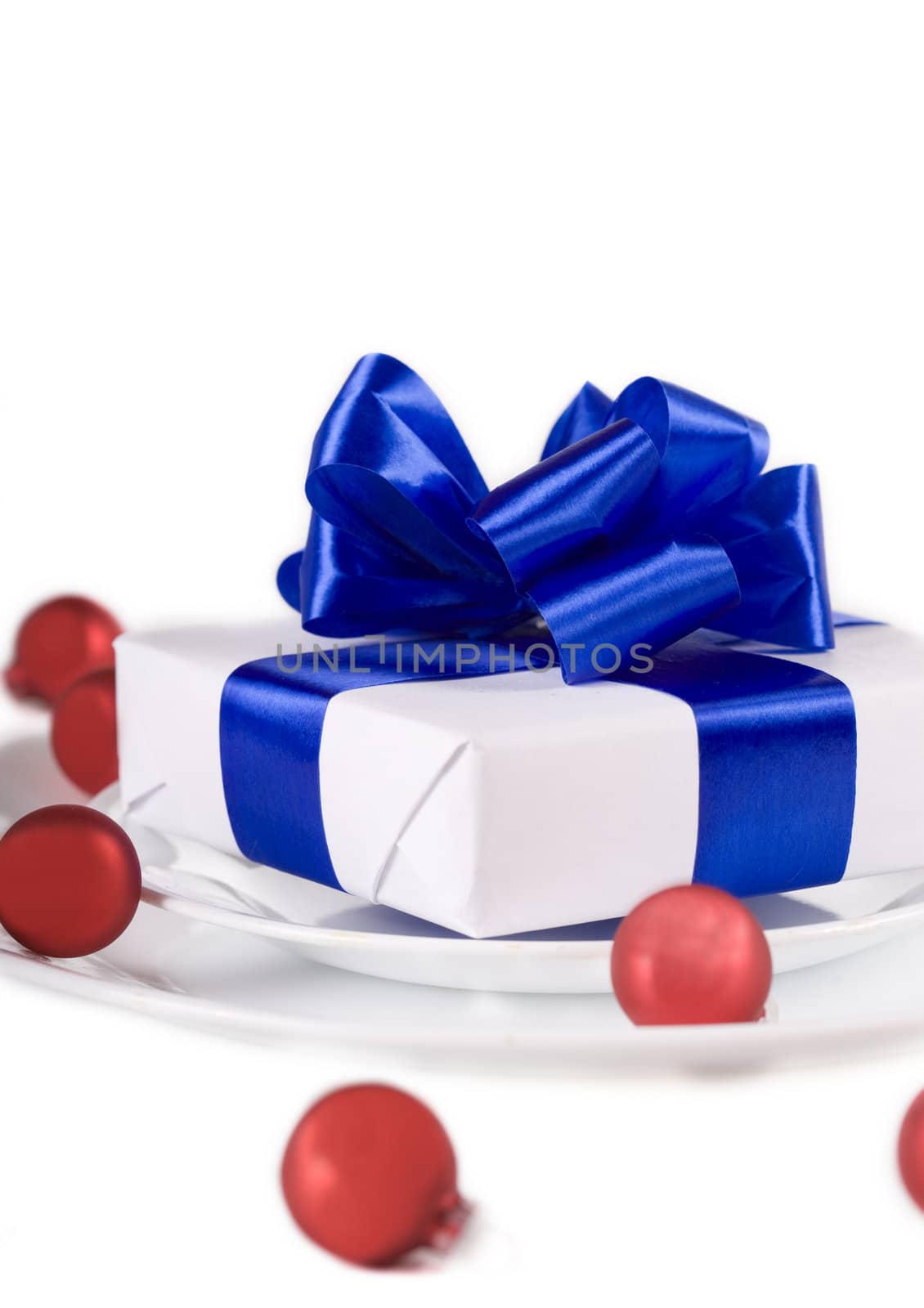 White present with blue ribbons by jarenwicklund
