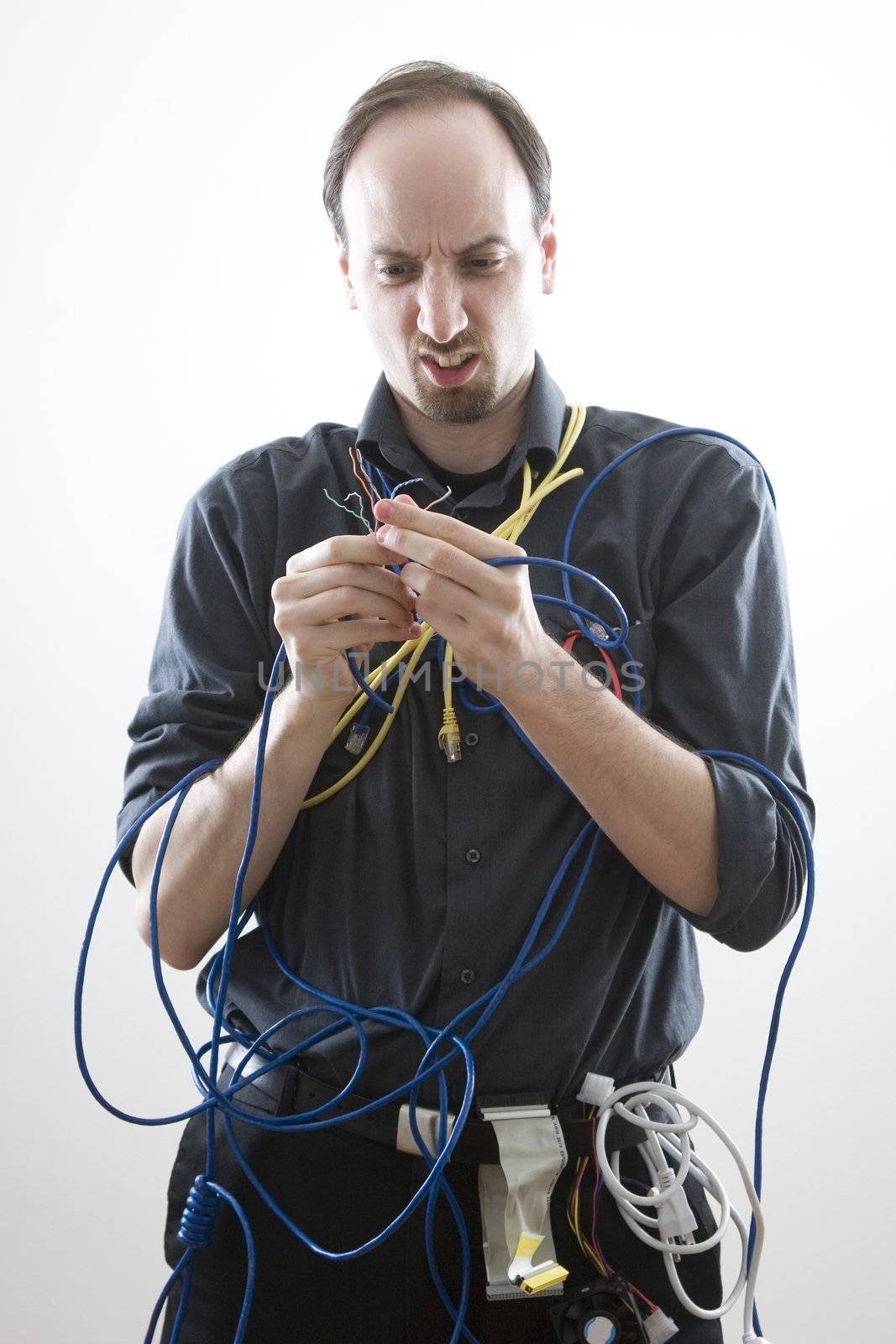 a clueless network technician looking at wires