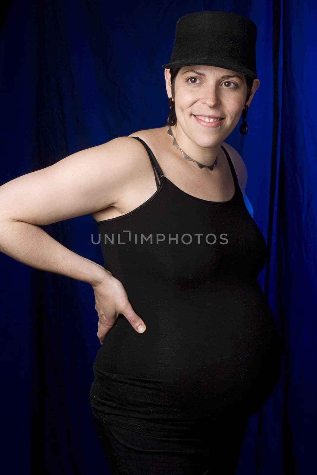 Twenty something pregnant women with boyish look