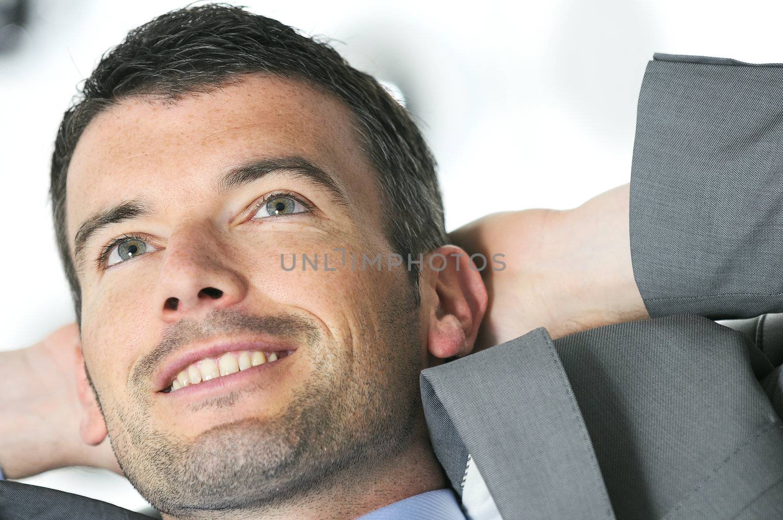 Attractive businessman is taking break from business